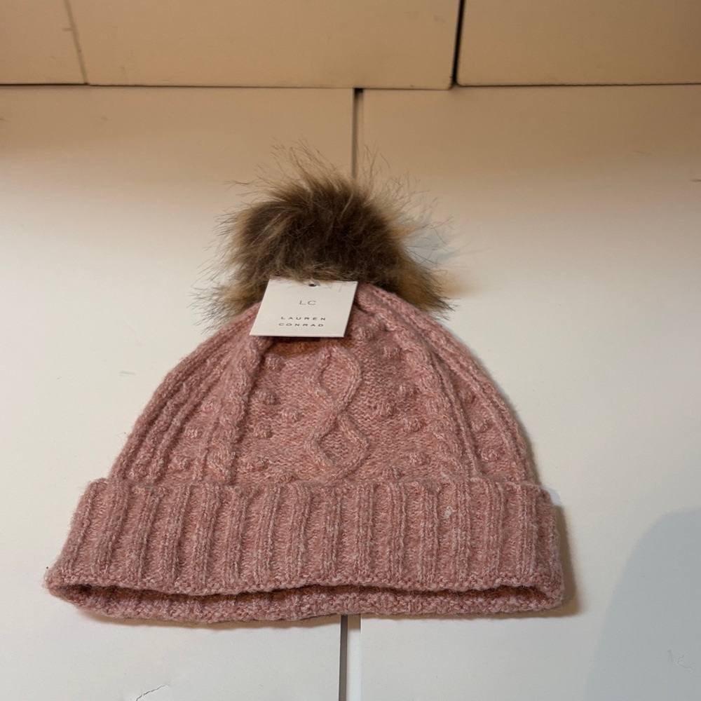 ITEM NO. 69: LC Lauren Conrad Pink Cable Knit Hat With Faux Fur Pom